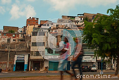 SALVADOR, BAHIA, BRAZIL: Street with modern houses in the city. The poor quarter, the so-called favelas Editorial Stock Photo