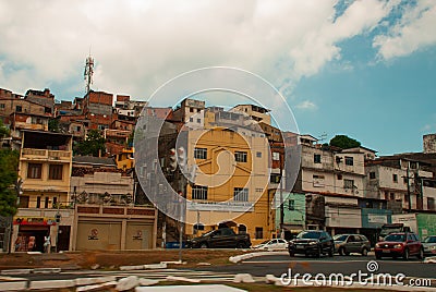 SALVADOR, BAHIA, BRAZIL: Street with modern houses in the city. The poor quarter, the so-called favelas Editorial Stock Photo