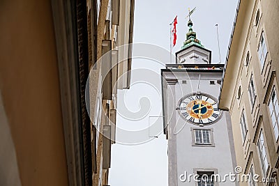 Salzburg, Austria, 28 August 2021: Grain Lane or Getreidegasse famous shopping narrow street in historic Altstadt, wrought iron Editorial Stock Photo