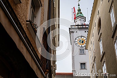 Salzburg, Austria, 28 August 2021: Grain Lane or Getreidegasse famous shopping narrow street in historic Altstadt, wrought iron Editorial Stock Photo