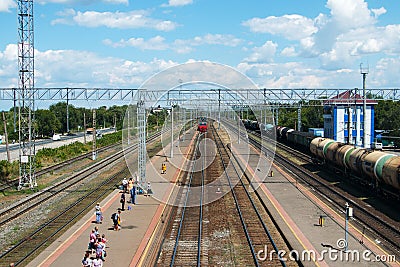 Samara Chapaevsk, Russia-July. 26. 2020: passenger cargo transportation, platform with passenger trains, people waiting for their Editorial Stock Photo