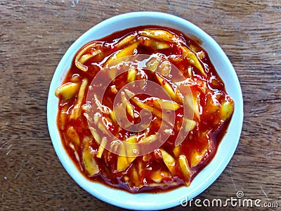 Sambal Embam is a combination of salty, sweet, sour and spicy Stock Photo