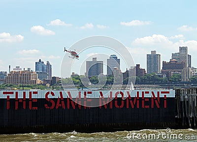 Helicopter landing in a piere the same moment Stock Photo