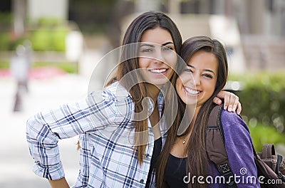 Same Sex Mixed Race Couple on School Campus Stock Photo