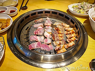 Samgyeopsal, grilled pork belly popular in South Korea. Stock Photo
