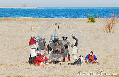 SAMOLVA, PSKOVSKAYA OBLAST, RUSSIA - APRIL 22: unindentified participants of historical reconstruction of the Batle on the Ice dre Editorial Stock Photo