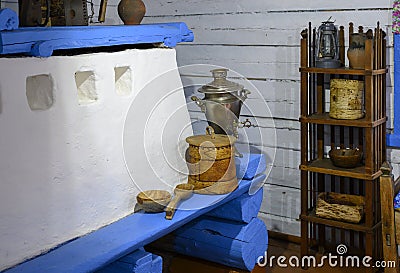 A samovar and a birch bark basket in the interior of a Shor wooden house of the early 20th century in a Siberian village Stock Photo