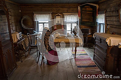 Samovar. Laid table. Clothes, dress. Gramophone. Inside the Serovâ€™s house. Kostroma region. Editorial Stock Photo