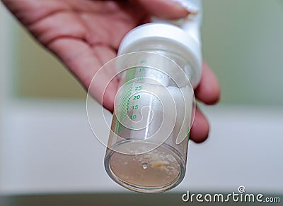 Sample of bronchial lavage after bronchoscopy of a patient Stock Photo