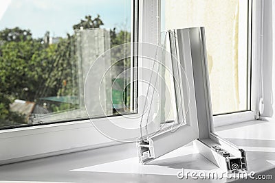 Sample of modern window profile on sill. Stock Photo