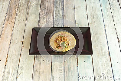 A sample tray of a Mexican carnitas taco on a cornmeal tortilla Stock Photo