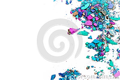 Makeup trends. Samples of dry blush, powder, bronzers and highlighter scattered on a white background. purple, blue, gray broken o Stock Photo