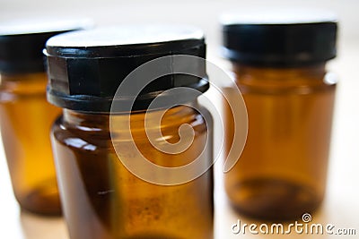 Sampling glass with black cap. Stock Photo