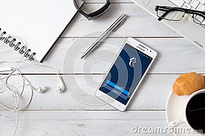 Samsung A5 with Tumblr application laying on desk. Editorial Stock Photo