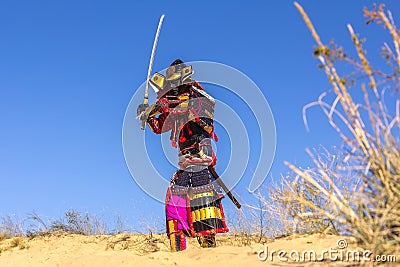 Samurai in ancient armor, with a sword. warrior Stock Photo