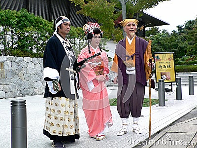 Samurai warrior and princess in Kimono dress, Kyoto Japan. Editorial Stock Photo