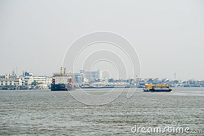 Commercial ships sail pass each other in Chao Phraya river Editorial Stock Photo