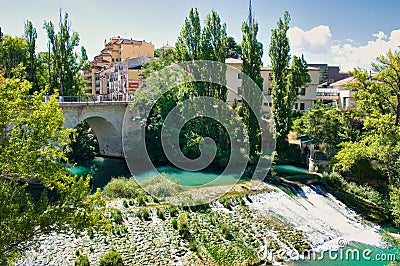 The San Anton bridge and the Jucar river as it passes through the city of Cuenca Stock Photo