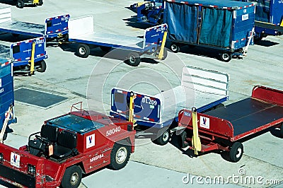 San Antonio airport - luggage carts on the ramp Editorial Stock Photo