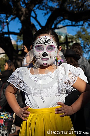 SAN ANTONIO, TEXAS - OCTOBER 28, 2017 - Girl wearing face paint for Dia de Los Muertos/Day of the Dead celebration Editorial Stock Photo