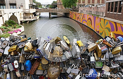 San Antonio, Texas, U.S - April 6, 2024 - Thousands of locks of love by the bridge on Dolorosa Street Editorial Stock Photo