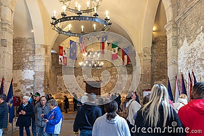 Tourists visit the church inside the Alamo, San Antonio, USA Editorial Stock Photo