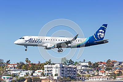 Alaska Airlines Skywest Embraer ERJ 175 airplane San Diego airport Editorial Stock Photo