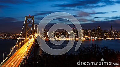 San Francisco Bay Bridge and skyline at night Stock Photo