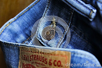 Levi Strauss 510 Jeans showing front Button and back label. Editorial Stock Photo