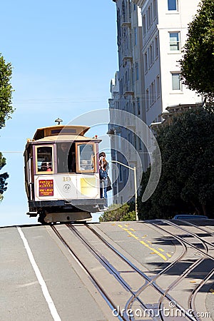 Tourists on traditional Cable car at Russian Hill Neighborhood, San Francisco Editorial Stock Photo