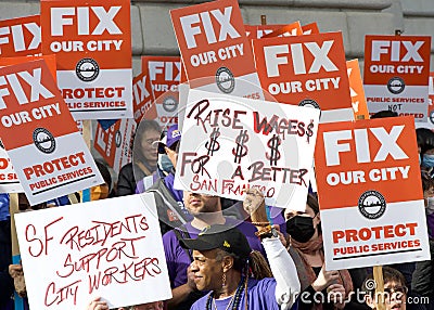 San Francisco City Union Workers on the steps of City Hall for a workers rights rally. Holding signs Editorial Stock Photo