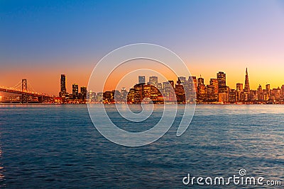 San Francisco sunset skyline California bay water reflection Stock Photo