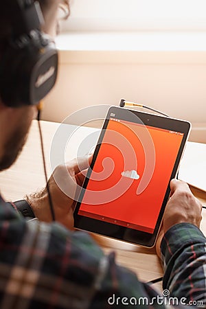 SAN FRANCISCO, US - 1 April 2019: Young man enjoying his favorite music, using Marshal headphones, in San Francisco, California, Editorial Stock Photo