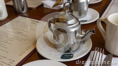 Antique silver teapot in Cliff House restaurant Editorial Stock Photo