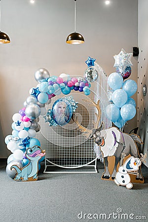 San Francisco, USA. May 2021. Festive balloons in blue and silver colors for your birthday. Frozen Heart style photo zone decor Editorial Stock Photo