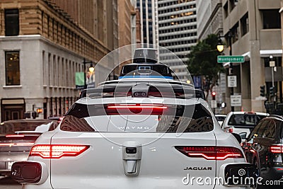 SAN FRANCISO, CALIFORNIA, USA -FEBRUARY 3, 2024: Waymo Self driving taxi car Editorial Stock Photo
