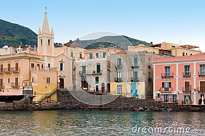 San Giuseppe church and multicolored houses in Lipari Stock Photo