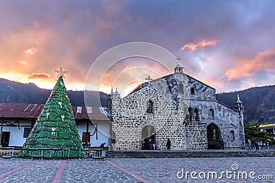 Christmas tree & Catholic church at sunset, Lake Atitlan, Guatemala Editorial Stock Photo