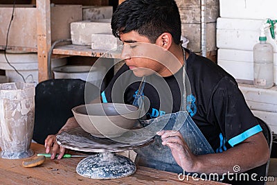 Young mexican man making clay bowls. San Martin Tilcajete, Oaxaca, Mexico Editorial Stock Photo