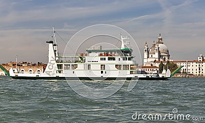 San Nicolo sea ferry sails in Venice lagoon, Italy. Editorial Stock Photo