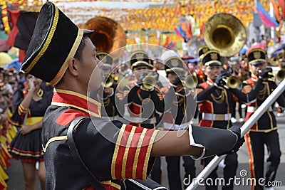 Band flag bearer lead the band during the annual brass band exhibition Editorial Stock Photo