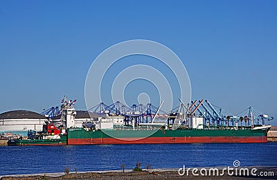 Tank barge Petrochem Supplier and its towing vessel, tugboat Corpus Christi, docked in the harbor of the Port of Los Angeles Editorial Stock Photo