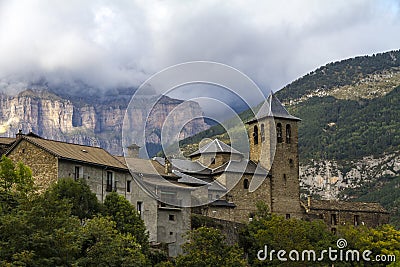 San Salvador Church in Torla, next to Ordesa y Monte Perdido National Park in the valley of Ordesa Stock Photo