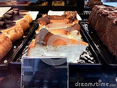 San Sebastian Cheesecake / Creamy Plain New York Style at Showcase of Restaurant. Stock Photo