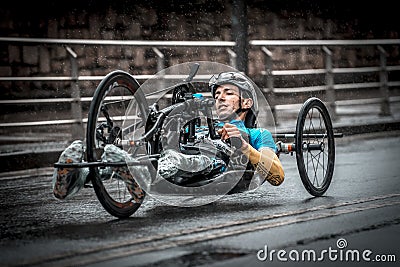 SAN SEBASTIAN, SPAIN - Nov 10, 2019: Disabled playing a race in the rain Editorial Stock Photo