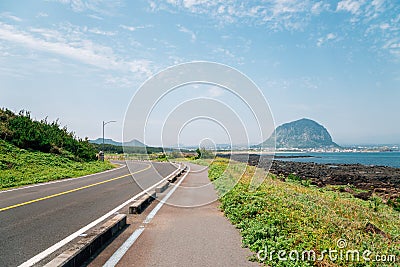 Sanbangsan Mountain and coastal road, Jeju Olle Trail in Jeju Island, Korea Stock Photo