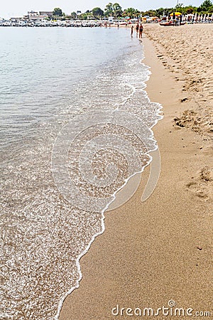 Sand beach in Giardini Naxos town in summer Editorial Stock Photo