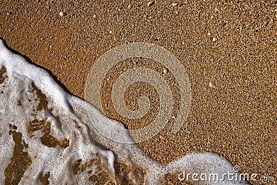 Sand beach waves foam in Costa Blanca Stock Photo