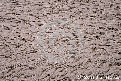 Sand bottom pattern after tide water goes out to sea, closeup photo Stock Photo