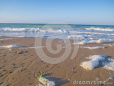 Sand castel by the sea. Games for kids on the beach. Stock Photo